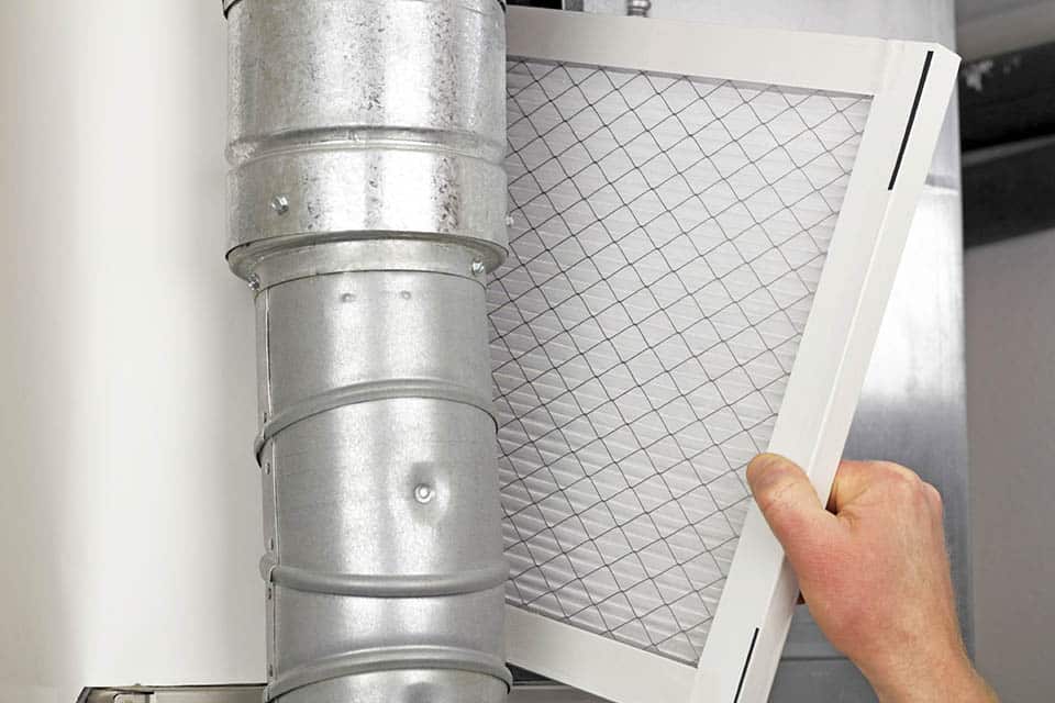 Close-up of an air filter during an HVAC air filter replacement