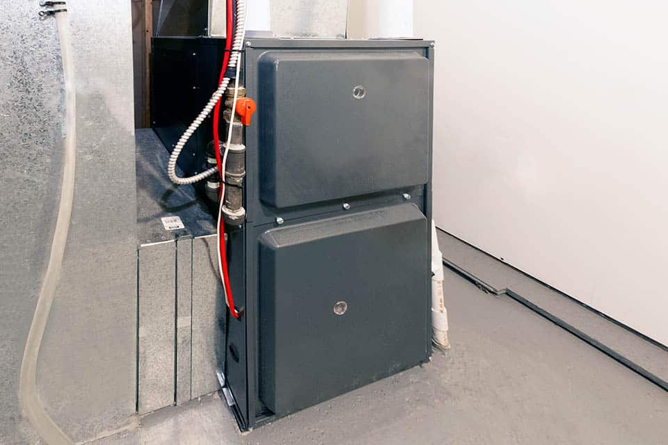 A high energy efficient furnace in a basement